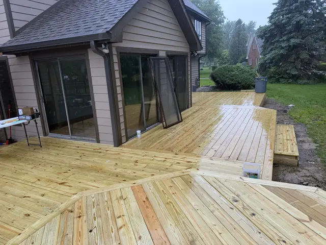 A finished multi-level wood deck.